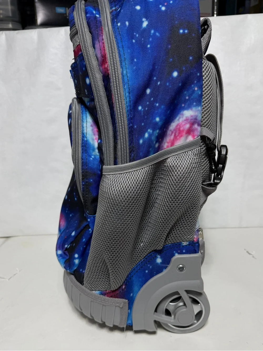 Tilami Deep Blue Galaxy Rolling Backpack 19 inch - pre owned condition